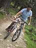 st.moritz july 2001 (030) kiko riding 2 bikes.jpg